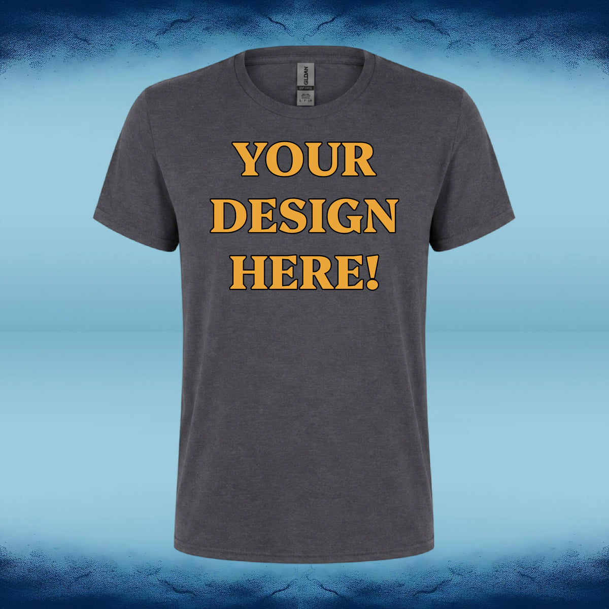 A dark gray heather crewneck t-shirt with the text 'YOUR DESIGN HERE!' printed in yellow on the chest, displayed against a blue gradient background.