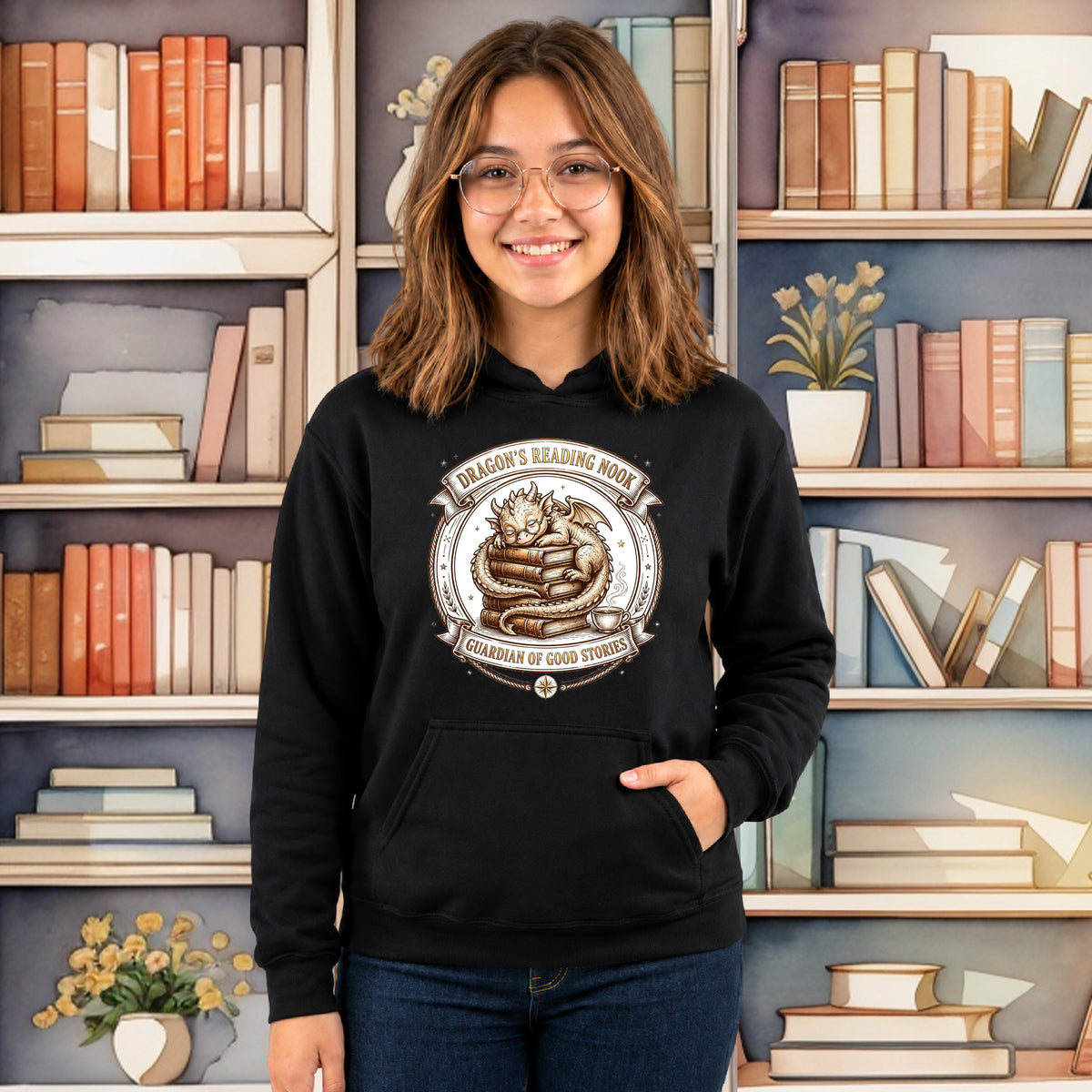 A young woman with glasses and brown hair stands in front of a bookshelf background wearing a black hoodie with a detailed graphic on the chest. The graphic features a circular emblem with a coiled dragon and the text 'DRAGON'S BENDING HORN' and 'Guardian of good stories'.