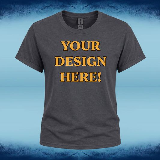 A dark gray heather t-shirt with 'YOUR DESIGN HERE!' printed in bold yellow letters with a black outline on the chest, displayed against a blue gradient background.