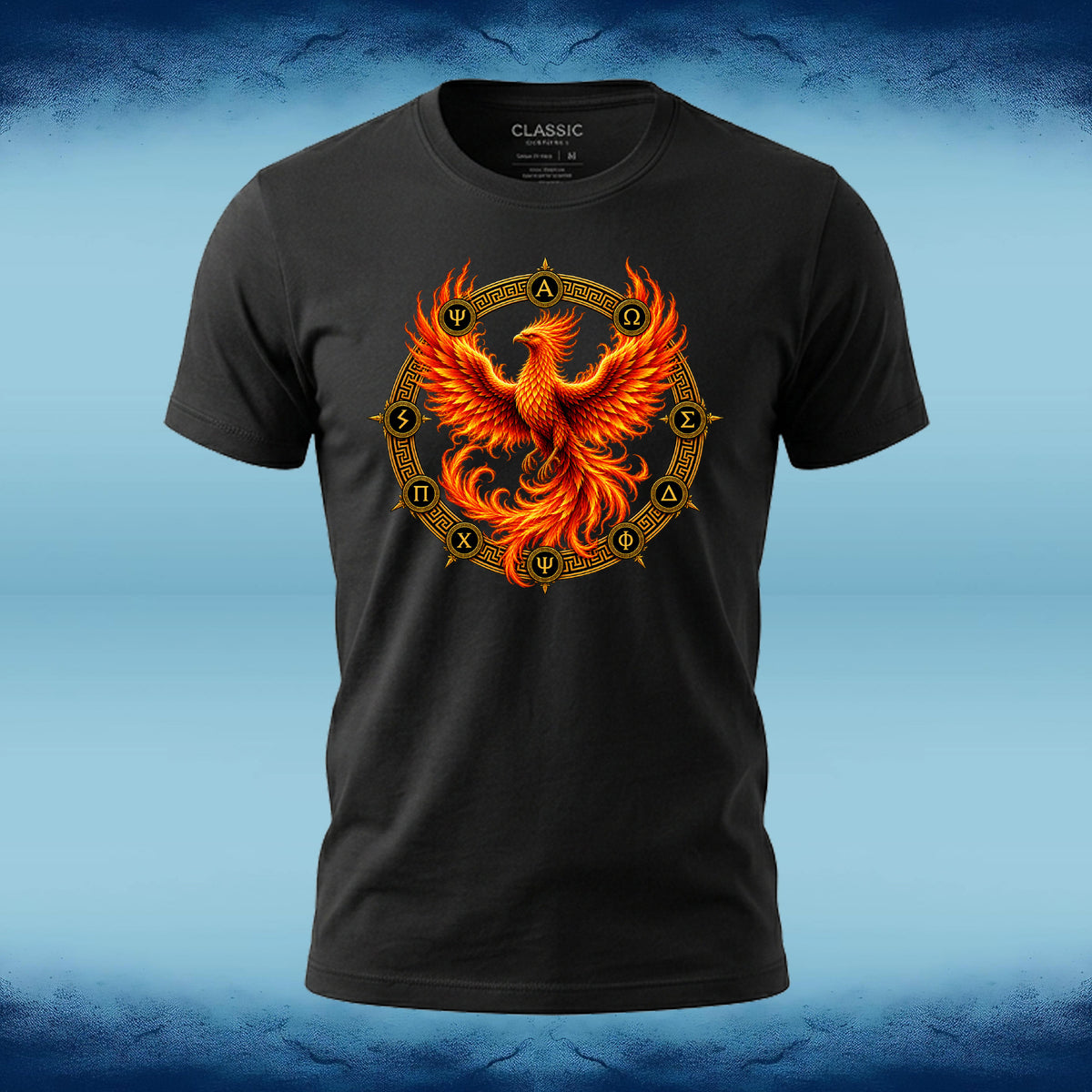 A black short-sleeve crewneck t-shirt featuring a vibrant graphic of a fiery phoenix in shades of orange and yellow, set against a circular gold zodiac wheel. The shirt is displayed on a blue textured background.