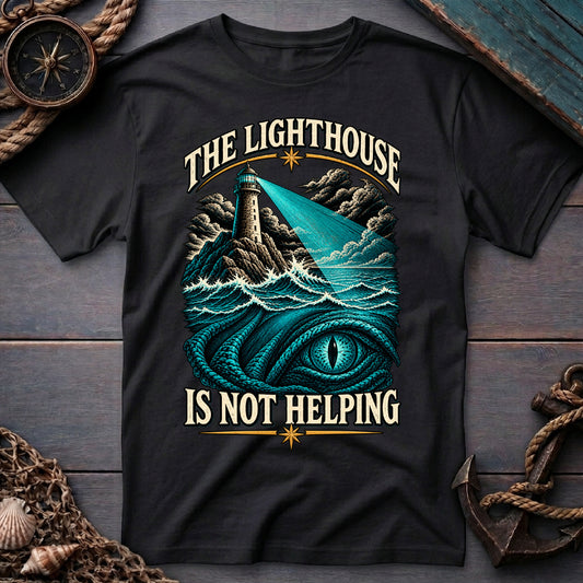 Black "The Lighthouse is Not Helping" humor tee laid flat, a funny nautical graphic tee by Sigil Harbor