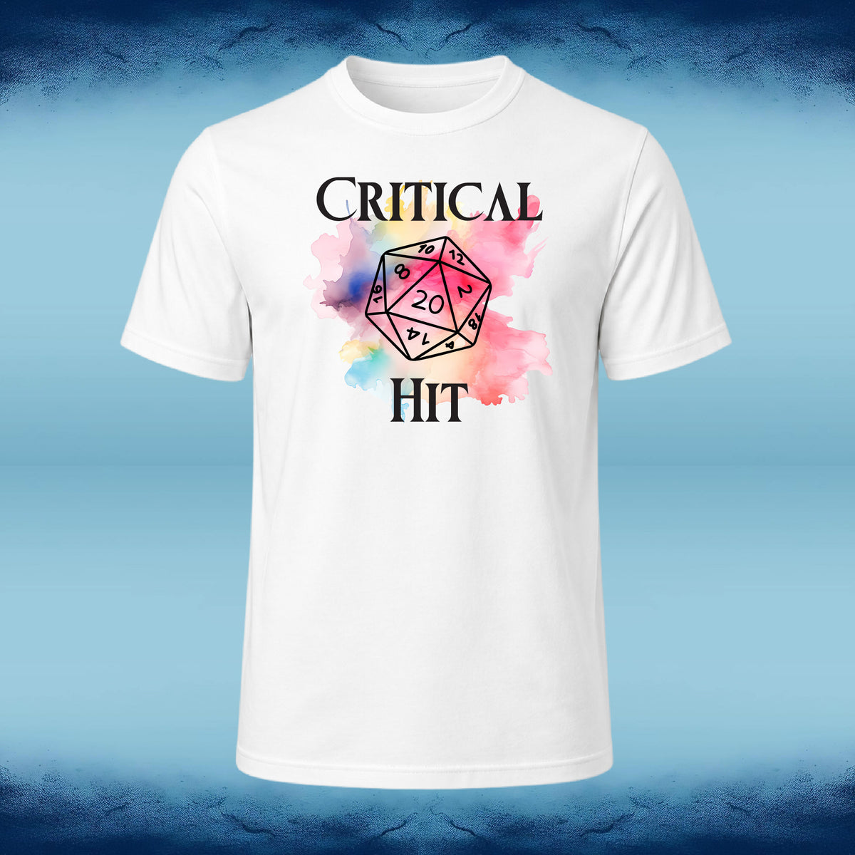 A white short-sleeve crewneck t-shirt featuring a graphic print of a 20-sided die with 'CRITICAL HIT' text, set against a blue textured background.